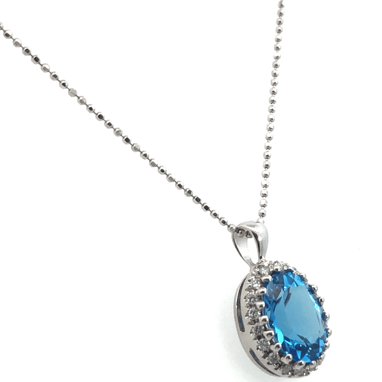 Ocean Spark Oval Blue Topaz & Diamond Halo Pendant ā 14K White Gold